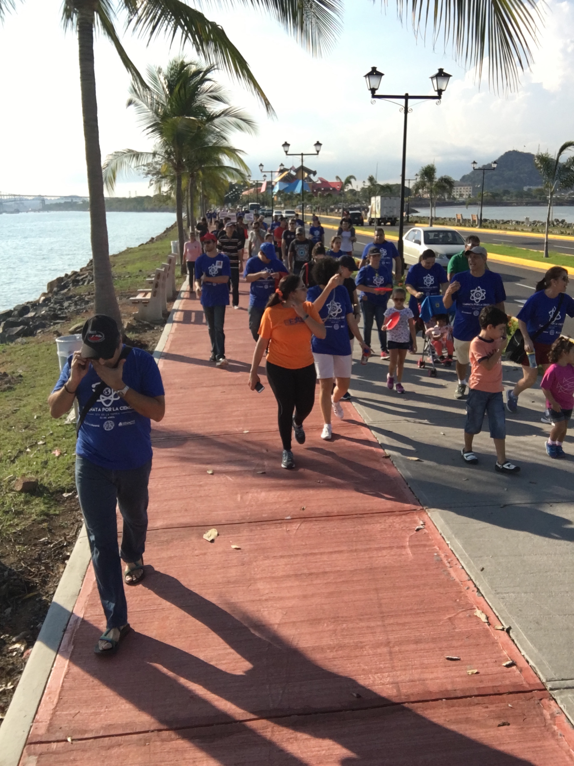 People walking together during the Caminata por la Ciencia on Amador Causeway, Panama City, Panama.