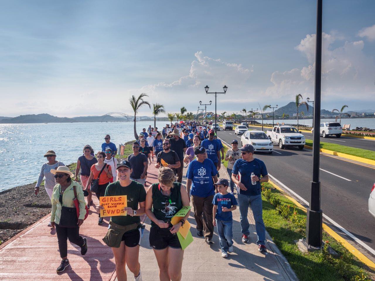 Supporters of science walking together during the Caminata por la Ciencia on Amador Causeway, Panama City, Panama.